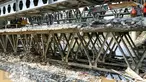 Pemprov DKI Jakarta mulai membongkar Jembatan Rawajati, Kalibata, Jakarta, Minggu (6/3/2016). Pasalnya, keberadaan jembatan tersebut menyebabkan pemukiman warga di sekitar Kali Ciliwung sering terendam banjir. (Liputan6.com/Yoppy Renato)