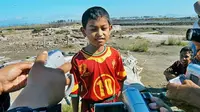 SELAMAT - Martunis selamat dari bencana Tsunami di Aceh. (ESPN)