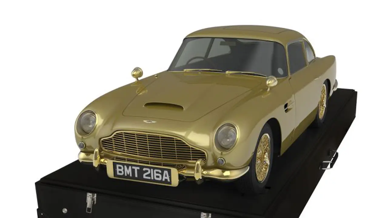 Miniatur Aston Martin DB5 Berbahan Emas Ini Dilelang
