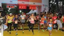 Peserta mengikuti lomba lari BNI UI Half Marathon di kampus UI Depok, Minggu (15/7). Sebanyak 3.600 peserta berlari di kategori 5K, 10K, dan 21K (half marathon) yang mengusung tema The Best Half Marathon inside Campus in Indonesia. (Liputan6.com/HO/Palar)