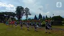 Peserta saat mengikuti Festival Gunungan di Lapangan Garuda Mandala Kompleks Candi Prambanan, Kabupaten Klaten, DIY, Selasa (31/12/2019). Festival ini menampilkan aneka gunungan, wayang kulit dan berbagai kesenian tradisional. (Liputan6.com/Gholib)