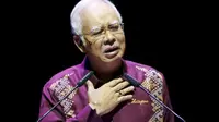 Najib Razak membantah menerima uang korupsi (Reuters)