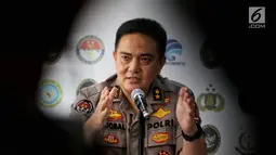 Kepala Divisi Humas Polri Irjen M Iqbal memberikan penjelasan saat jumpa pers terkait perkembangan kerusuhan 21-22 Mei 2019 di Jakarta, Selasa (11/6). Polisi Telah menetapkan 6 tersangka perencana pembunuhan terhadap 4 tokoh nasional.  (Liputan6.com/Johan Tallo)