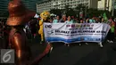 Parade Hari Pelanggan Nasional (Harpelnas) 2016 di Kawasan Bundaran Hotel Indonesia, Jakarta, Minggu (4/9). Kegiatan tersebut sebagai bentuk kepedulian bersama kepada pelanggan. (Liputan6.com/Johan Tallo)