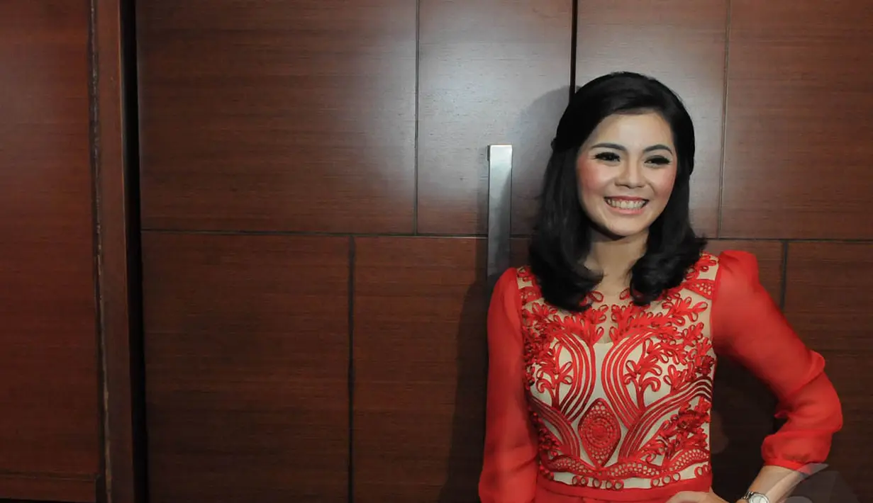 Motivator Merry Riana saat menghadiri gala premier film yang menceritakan tentang dirinya di Plaza Senayan, Jakarta, Senin (22/12/2014). (Liputan6.com/Herman Zakharia)