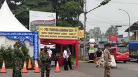 Polres Metro Tangerang Kota mendirikan posko penyekatan mudik. (Liputan6.com/Pramita Tristiawati)