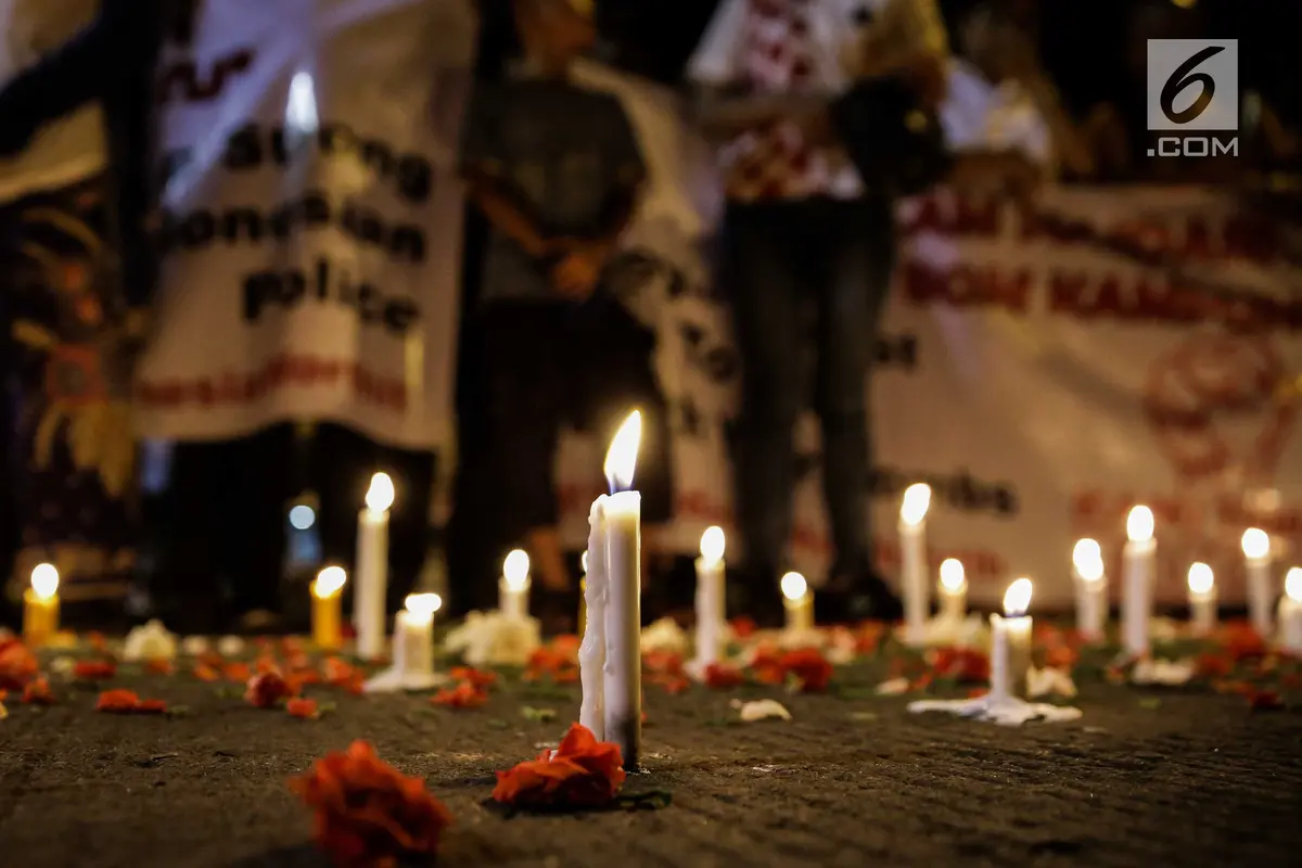 Aksi Nyala Lilin di Lokasi Bom Kampung Melayu