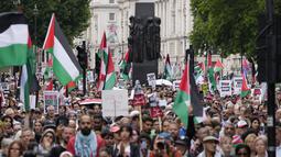 Aksi unjuk rasa ini bagian dalam ‘Pawai Nasional untuk Palestina’ yang diselenggarakan oleh Kampanye Solidaritas Palestina. (CARLOS JASSO/AFP)