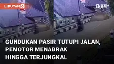 Gundukan pasir menutupi sebuah jalan mencelakai pemotor mengundang perhatian