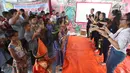 Anak-anak mengikuti kegiatan pentas seni dalam acara bertajuk Kampung Jogo Kali di kawasan Lodan, Jakarta Utara, Minggu (12/11). Acara tersebut diadakan dalam rangka perayaan Hari Ciliwung ke-6. (Liputan6.com/Immanuel Antonius)
