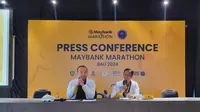 Presiden Direktur Maybank Indonesia, Steffano Ridwan (kiri) dan Project Director Maybank Marathon, Widya Permana, dalam sesi konferensi pers Maybank Marathon 2024, di Gianyar, Bali, Sabtu (24/8/2024). (Bola.com/Yus Mei Sawitri)