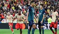 Pemain RC Lens, Elye Wahi, melakukan selebrasi setelah mencetak gol ke gawang Arsenal pada laga Liga Champions di Stade Bollaert-Delelis, Rabu (4/10/2023). RC Lens menang dengan skor 2-1. (AFP/Denis Charlet)