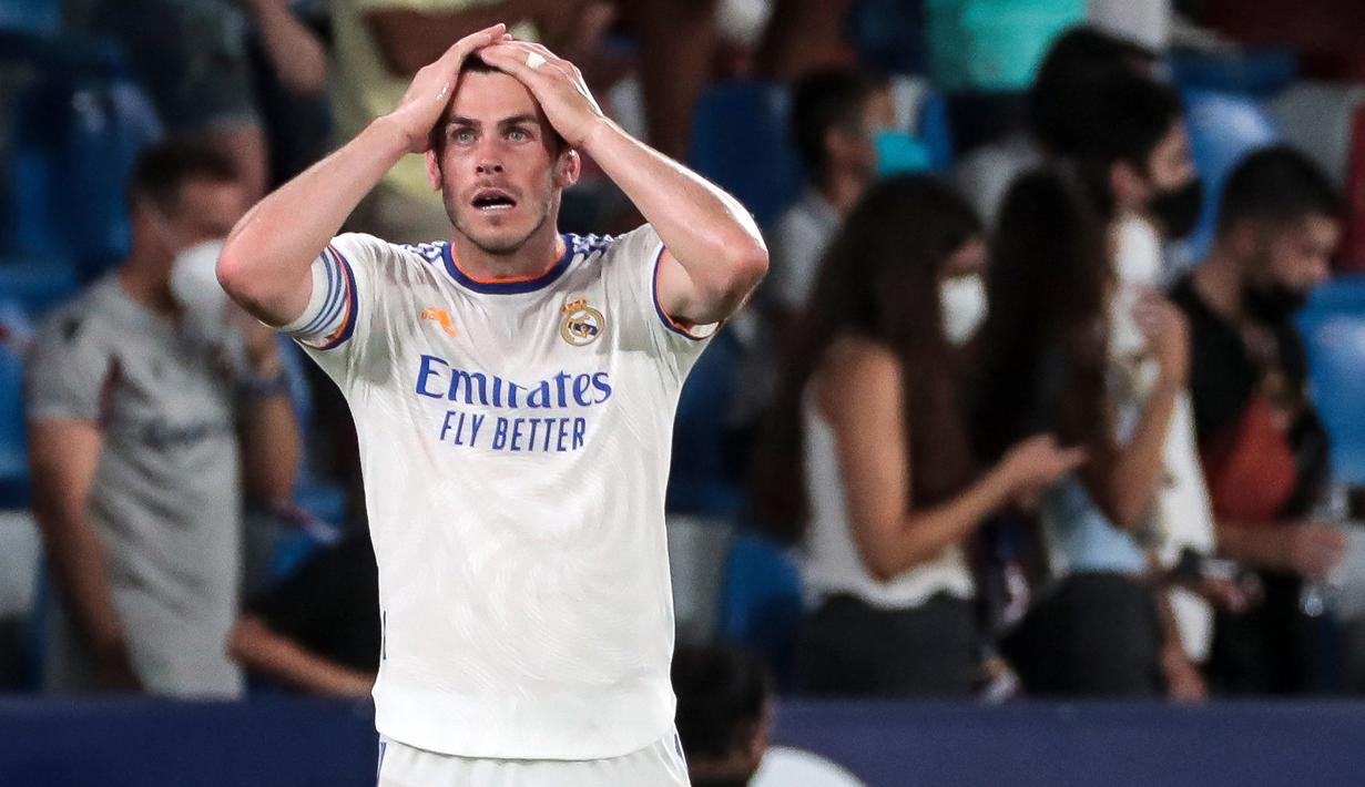 Gareth Bale - Mantan pemain Tottenham ini sempat menjadi andalan dan memegang peran penting dalam empat gelar di Liga Champions Real Madrid. Namun karena performanya terus menurun kini pemain berusia 32 tahun itu lebih sering menjadi penghangat di bangku cadangan. (AFP/Jose Miguel Fernandes)