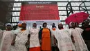 Aksi aktivis dari Jaringan Nasional Advokasi Pekerja Rumah Tangga (Jala PRT) di depan DPR, Jakarta, Selasa (25/11/2014). (Liputan6.com/Faizal Fanani)