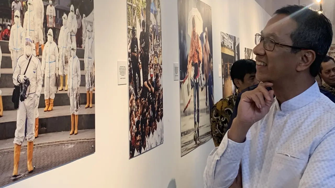 Pejabat Gubernur DKI Jakarta Heru Budi Hartono menghadiri pembukaan acara pameran galeri foto jurnalistik yang diselenggarakan oleh LKBN ANTARA, Jumat (16/2/2024). (Foto: Liputan6.com/Natasha KA)