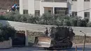 Pasukan pertahanan Israel (IDF) mengonfirmasi pihaknya melakukan serangan secara besar-besaran tersebut. (AFP/Jaafar Ashtiyeh)