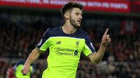 Gelandang Liverpool Adam Lallana merayakan gol ke gawang Middlesbrough pada laga Premier League di Stadion Riverside, Middlesbrough, Rabu (14/12/2016). (AFP/Lindsey Parnaby)