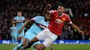 Striker muda Manchester United, Anthony Martial, memang kerap merepotkan pertahanan lawan dengan kemampuan berlarinya. (AFP/Oli Scarff)
