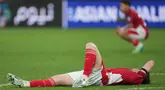 Pemain Timnas Indonesia terkapar lesu setelah ditaklukkan Australia dalam matchday ketujuh Grup C di Sydney Football Stadium, Sydney, pada Kamis (20/3/2025) sore WIB. (AP Photo/Mark Baker)