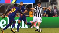Penyerang Juventus, Paulo Dybala saat menghadapi Barcelona pada ajang International Champions Cup (ICC) 2017. (Jewel SAMAD / AFP)