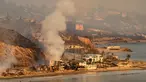 Dalam foto yang diambil dari helikopter ini, memperlihatkan kondisi rumah-rumah terbakar di Pacific Coast Highway saat kebakaran Palisades di Malibu, California, pada tanggal 9 Januari 2025. (JOSH EDELSON/AFP)