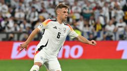 Joshua Kimmich telah memperkuat Timnas Jerman sejak tahun 2015. Sebagai pemain reguler di Bayern dan Der Panzer, Kimmich memiliki harga pasar yang cukup lumayan. Nilainya mencapai angka 50 juta euro. (AFP/Miguel Medina)