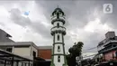 Menara masjid, kini dasarnya tercakup dalam ruangan baru di depan masjid lama, berbentuk silinder setinggi dua belas meter.  (Liputan6.com/Johan Tallo)