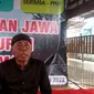 Mbah Pramugi saat diwawancarai Liputan6.com di Pendopo Sedulur Sikep Desa Sambongrejo, Kecamatan Sambong, Kabupaten Blora. (Liputan6.com/Ahmad Adirin)