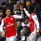 Mesut Ozil berselebrasi usai cetak gol (REUTERS/Eddie Keogh )