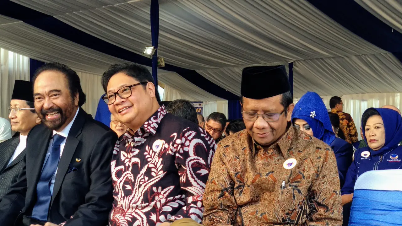 Ketua Umum Partai Golkar Airlangga Hartarto dan Mahfud MD hadiri ABN NasDem (Liputan6.com/ Putu Merta Surya Putra).