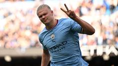 Erling Haaland tampil mengagumkan pada musim perdananya di Liga Inggris bersama Manchester City. Ia menjelma menjadi mesin gol untuk The Cityzens dengan menorehkan 33 gol dalam 31 laga. Hal tersebut membuat skuad asuhan Pep Guardiola itu berkesempatan untuk mengambil alih pimpinan dari Arsenal di beberpa pertandingan terakhir. Selain dirinya, berikut ini daftar pencetak gol terbanyak dalam 8 tahun terakhir. (AFP/Oli Scarff)