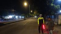 Lokasi tabrakan beruntun diduga karena balap liar. (Hermawan/Liputan6.com)