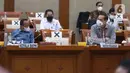 Menteri Perdagangan Muhammad Lutfi (kanan) dan Kepala Badan Koordinasi Penanaman Modal (BKPM) Bahlil Lahadalia hadir pada rapat kerja di ruang rapat Komisi VI DPR RI, kompleks parlemen, Jakarta, Rabu (3/2/2021).  (Liputan6.com/Angga Yuniar)