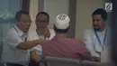 Politisi PAN, Saleh Partaunan, Drajad Wibowo dan anak Amien Rais, Hanafi Rais di Gedung KPK, Senin (6/5). Mereka mewakili Amien Rais untuk menjelaskan uang Rp600 juta di kasus korupsi pengadaan alkes yang menjerat Siti Fadilah (Liputan6.com/Faizal Fanani)