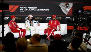 Lando Norris (tengah) bersama duo pembalap Scuderia Ferrari, Charles Leclerc dan Lewis Hamilton. ()