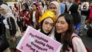 Melalui pawai ini, diharapkan mampu menginspirasi perempuan untuk terus meningkatkan kapasitas dan perannya di berbagai sektor kehidupan. (Liputan6.com/Herman Zakharia)