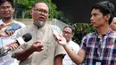 Ekspresi mantan Wakil Ketua KPK, Bambang Widjojanto menjawab pertanyaan awak media di halaman KPK, Jakarta, Jumat (4/3). Kedatangan BW buntut dari kebijakan Kejagung yang menutup atau mengesampingkan kasus hukum yang menimpanya (Liputan6.com/Helmi Afandi)