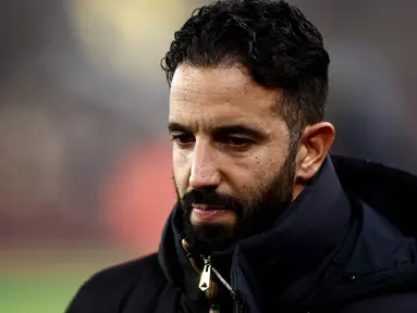 Pelatih Manchester United, Ruben Amorim bereaksi menjelang pertandingan sepak bola Liga Premier Inggris2024/2025 melawan Wolverhampton Wanderers di stadion Molineux di Wolverhampton, Inggris pada 26 Desember 2024 waktu setempat atau Jumat 27 Desember 2024 dini hari WIB. (HENRY NICHOLLS/AFP)