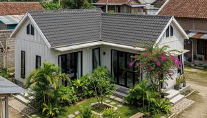 Rumah Kecil Scandinavian di Desa dengan Kebun Belakang Mini. (Foto: AI)