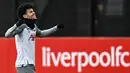 Pemain Liverpool Luis Diaz bereaksi saat mengambil bagian dalam sesi latihan di Liverpool, Inggris, 14 Maret 2023. Liverpool akan menghadapi Real Madrid pada pertandingan sepak bola leg kedua babak 16 besar Liga Champions. (Paul ELLIS/AFP)