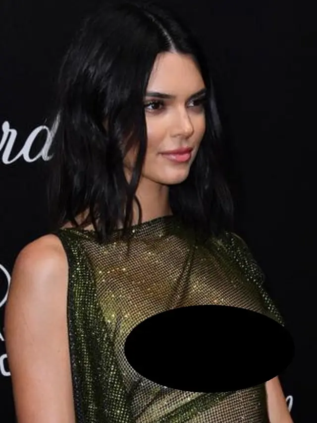 Model AS Kendall Jenner berpose saat menghadiri Secret Chopard Party di sela-sela festival film Cannes ke-71 di Cannes, Prancis (11/5). (AFP/Yann Coatsaliou) Event