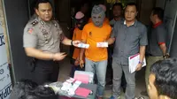 Polisi tangkap pemalsu uang di Medan (Liputan6.com / Reza Efendi) 