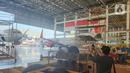 Suasana hanggar pesawat Batam Aero Technic (BAT) di Bandar Udara Internasional Hang Nadim, Batam, Kamis 21 Maret 2024. (Foto: Liputan6.com)
