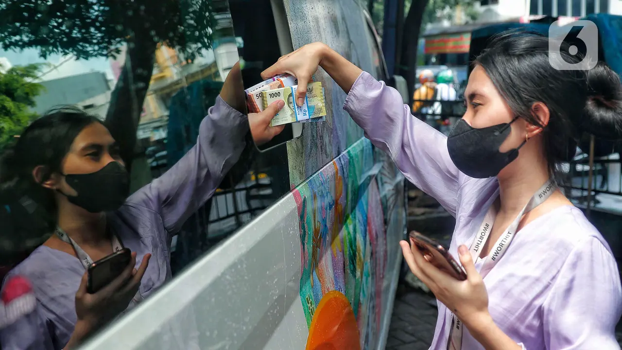 Warga Mulai Berburu Penukaran Uang Baru Lebaran