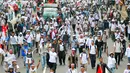 Massa dari Pergerakan Pelaut Indonesia (PPI) berunjuk rasa di Jalan Merdeka Barat, Jakarta, Kamis (12/5). Dalam aksinya, massa menuntut pemerintah memperhatikan kesejahteraan dan peningkatan upah mereka. (Liputan6.com/Yoppy Renato)