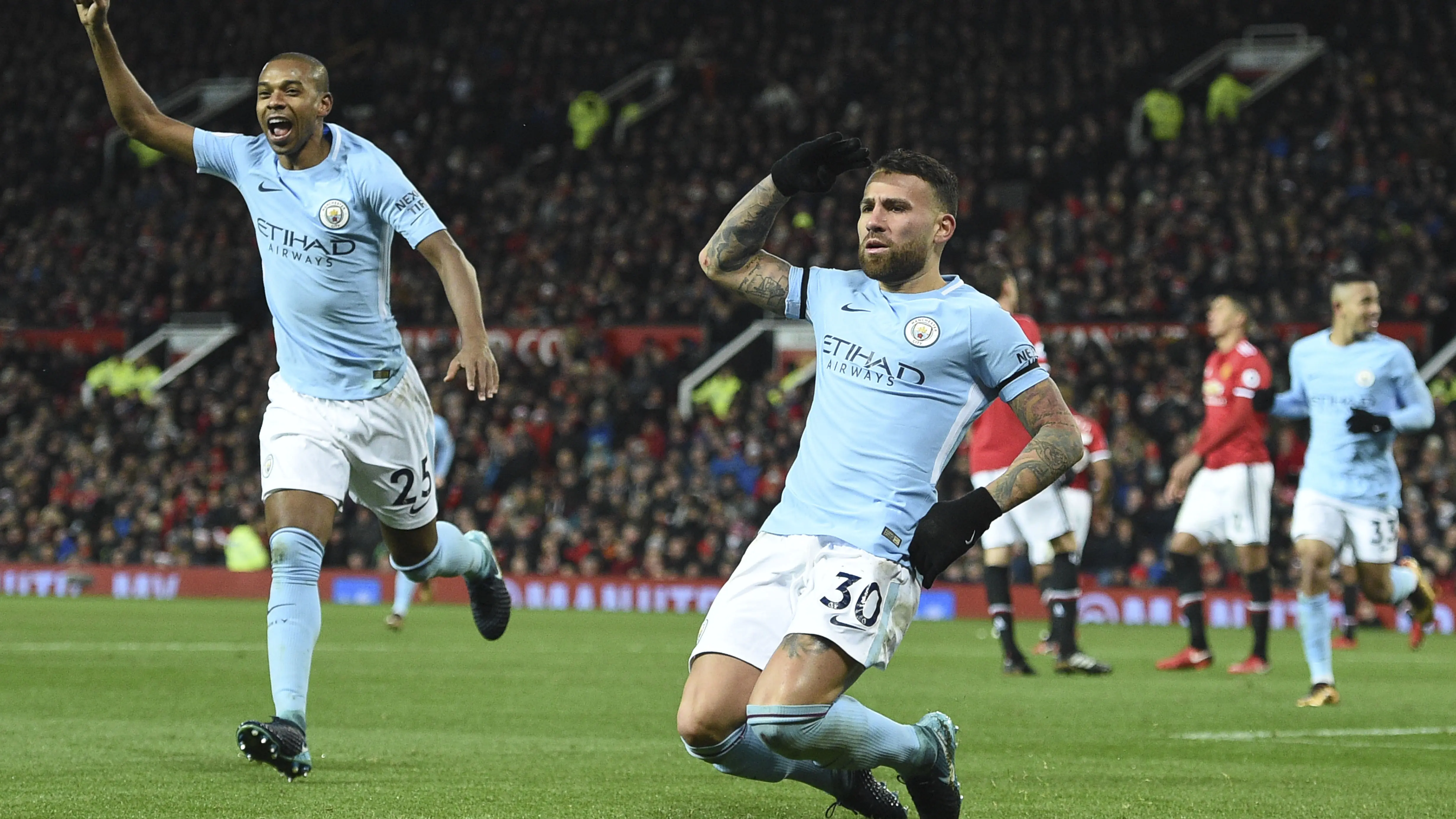 Satu golnya ke gawang Manchester United menambah pundi-pundi gol bek subur Manchester City, Nicolas Otamendi. Gol tersebut membuat dirinya berada pada urutan keenam top scorer klub dengan torehan lima gol. (AFP/Oli Scarff)