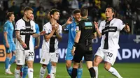 Ketegangan terjadi saat pertandingan Parma vs Napoli pada pekan 37 Liga Italia 2024/2025 di Stadion Tardini, Senin (19/5/2025) dini hari WIB. (Piero CRUCIATTI / AFP)