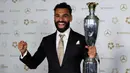 Bintang Liverpool Mohamed Salah kembali menorehkan prestasi pribadi dengan meraih penghargaan PFA Men's Player of The Year alias Pemain Pria Terbaik versi Professional Footballer's Association (PFA) dalam PFA Awards 2025. (Darren Staples/AFP)