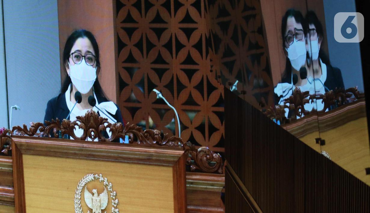 Ketua DPR Puan Maharani berpidato pada Rapat Paripurna Pembukaan Masa Persidangan IV Tahun Sidang 2020-2021 di Kompleks Parlemen, Senayan, Jakarta, Senin (8/3/2021). Rapat Paripurna tersebut beragenda pidato pembukaan masa persidangan oleh Ketua DPR. (Liputan6.com/Angga Yuniar)