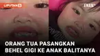 Seorang anak balita menggunakan behel gigi mengundang perhatian